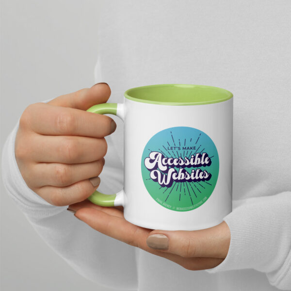 Coffee mug with green inside and Let's Make Accessible Websites outside